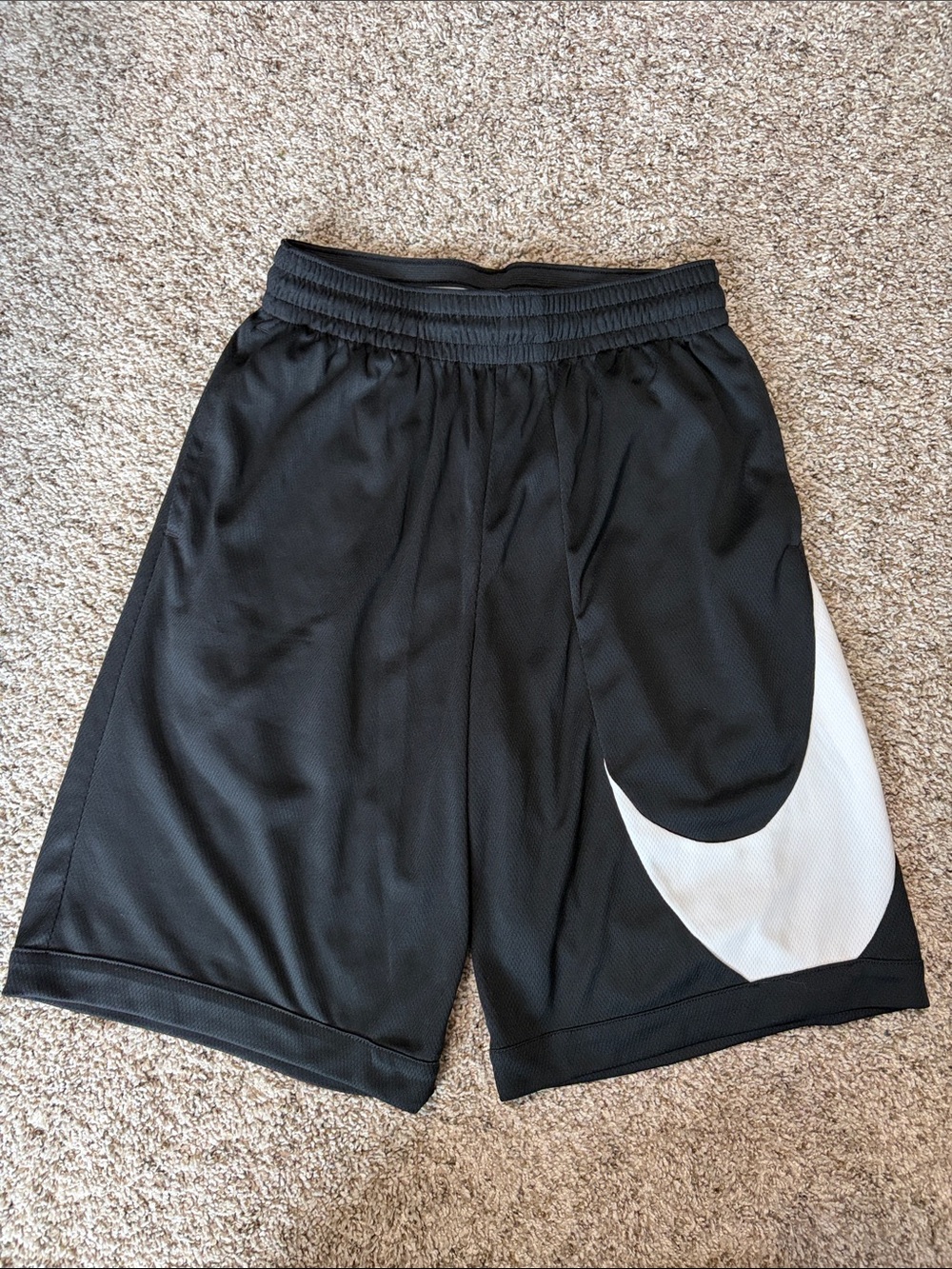 Nike Black Athletic Shorts with Large White Swoosh